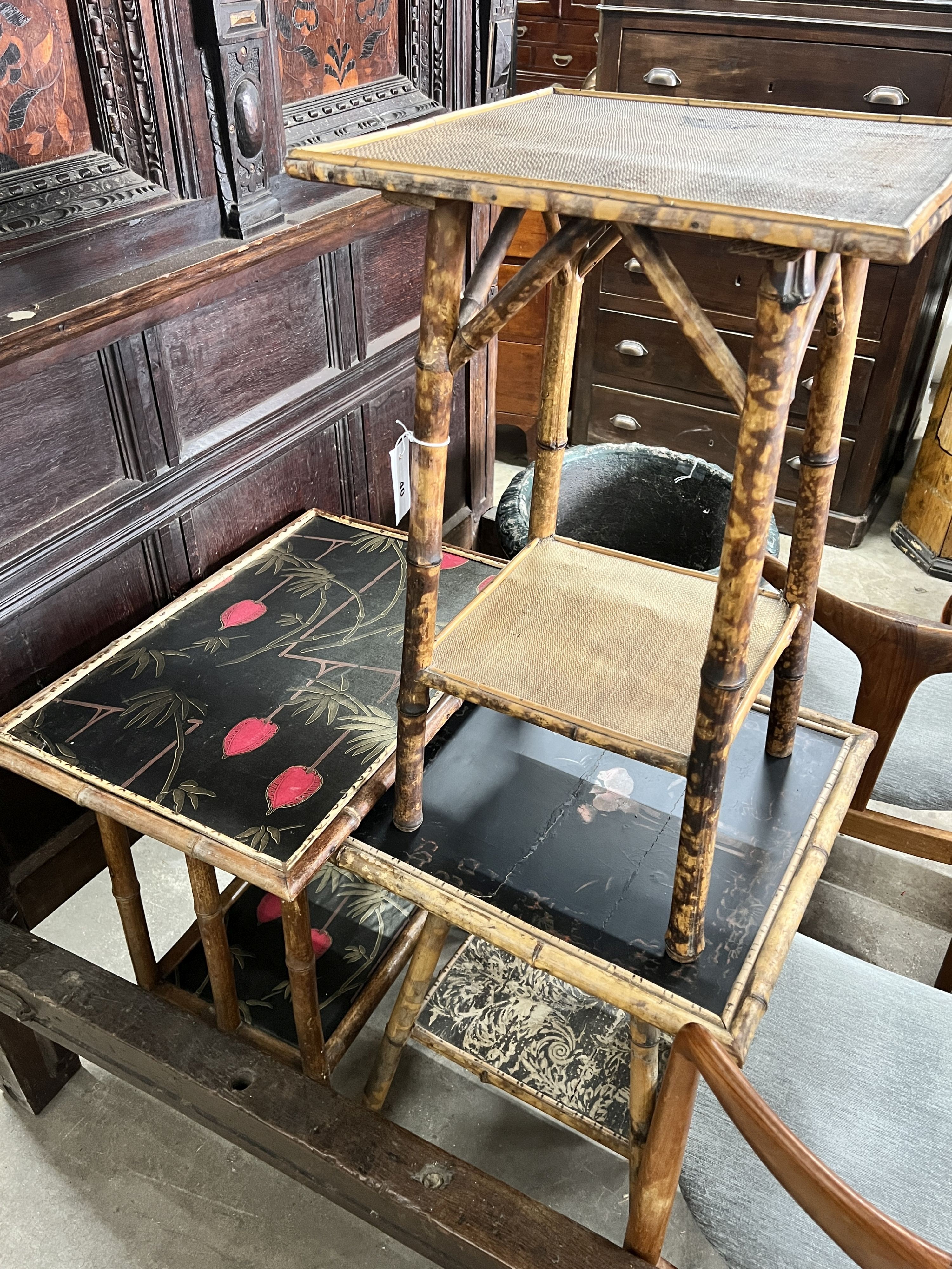 An Edwardian square lacquered bamboo two tier occasional table, width 50cm, height 70cm, a rectangular painted bamboo table and one other.